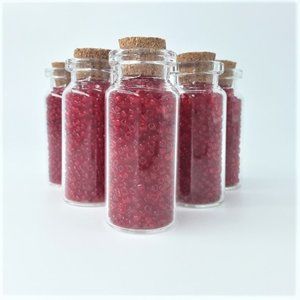 Red Transparent Glass Seed Beads in Glass Bottles